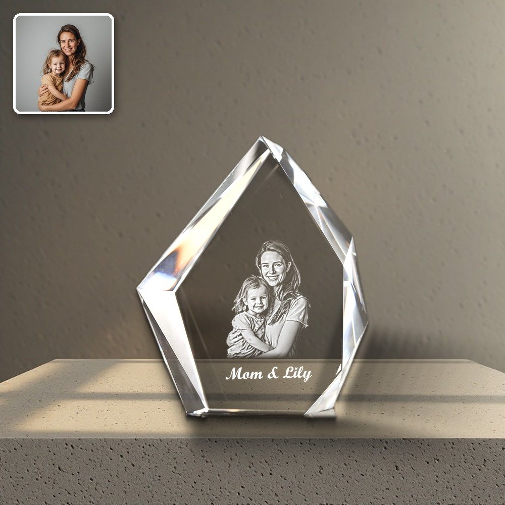 3D Prestige crystal laser engraved with a mother and child photo on a concrete shelf