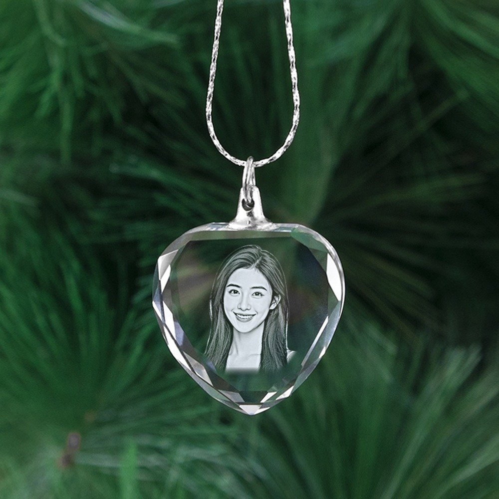 Crystal heart necklace laser engraved with a woman portrait